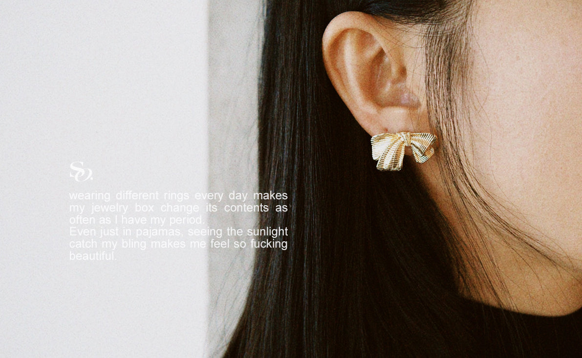 Golden bow earrings