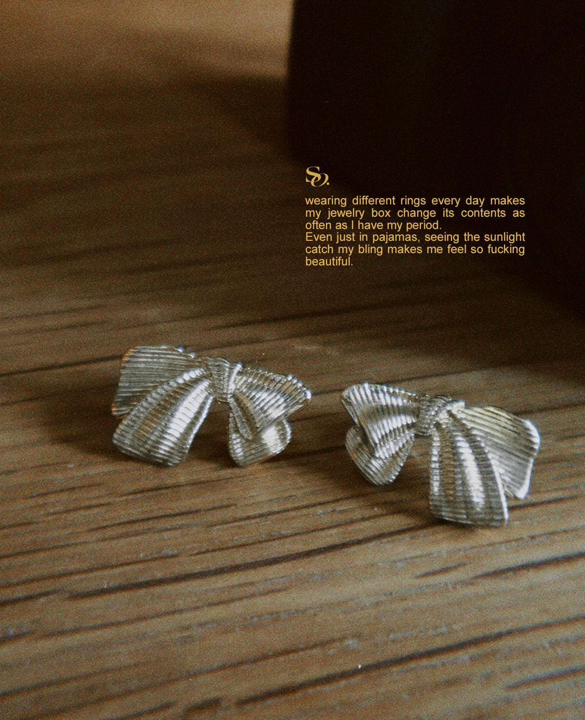 Silver bow earrings
