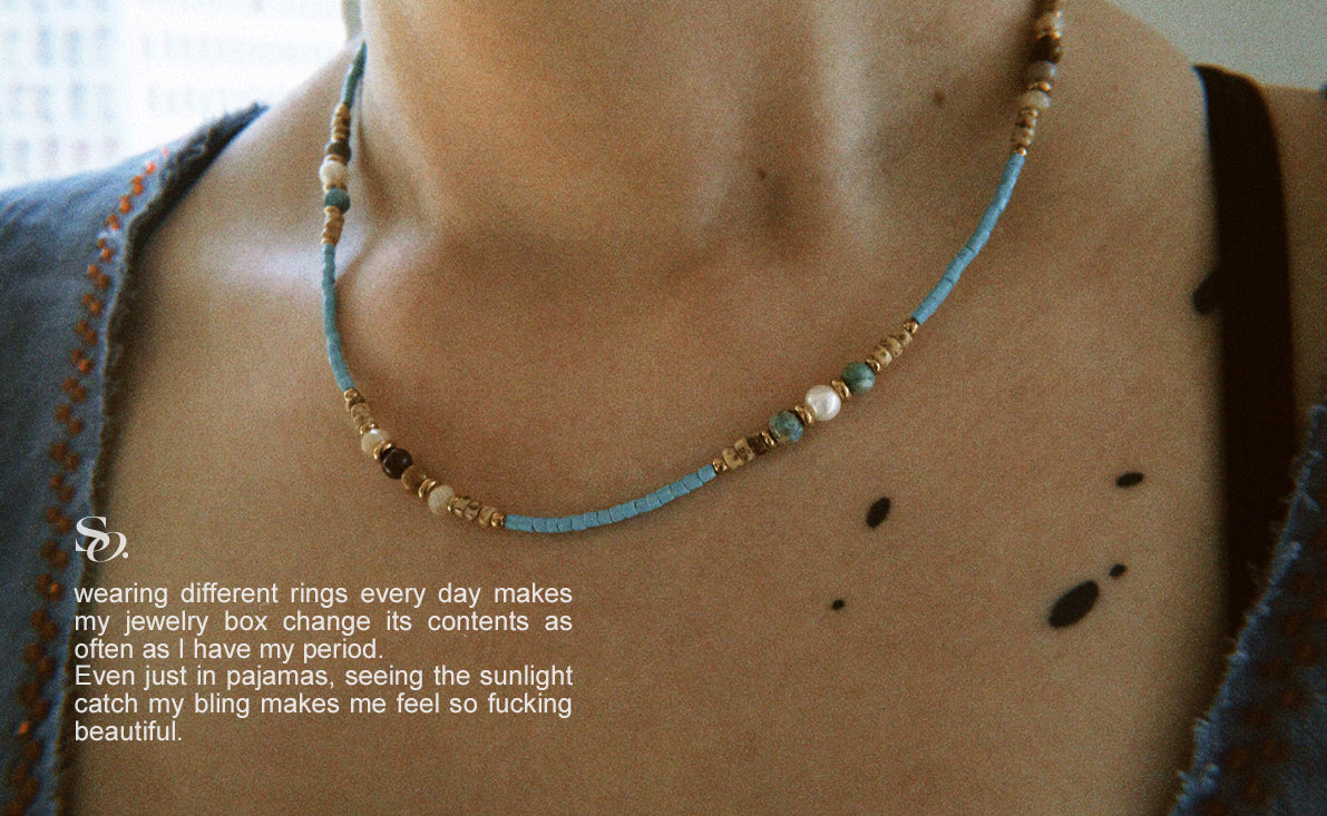 Half blue floral necklace